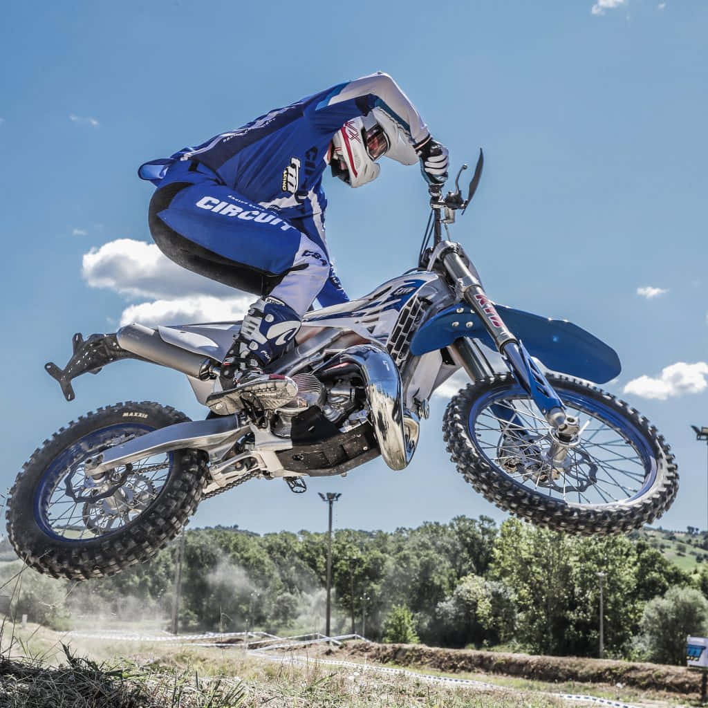 T M Racing Motocross Jumpin Action Wallpaper