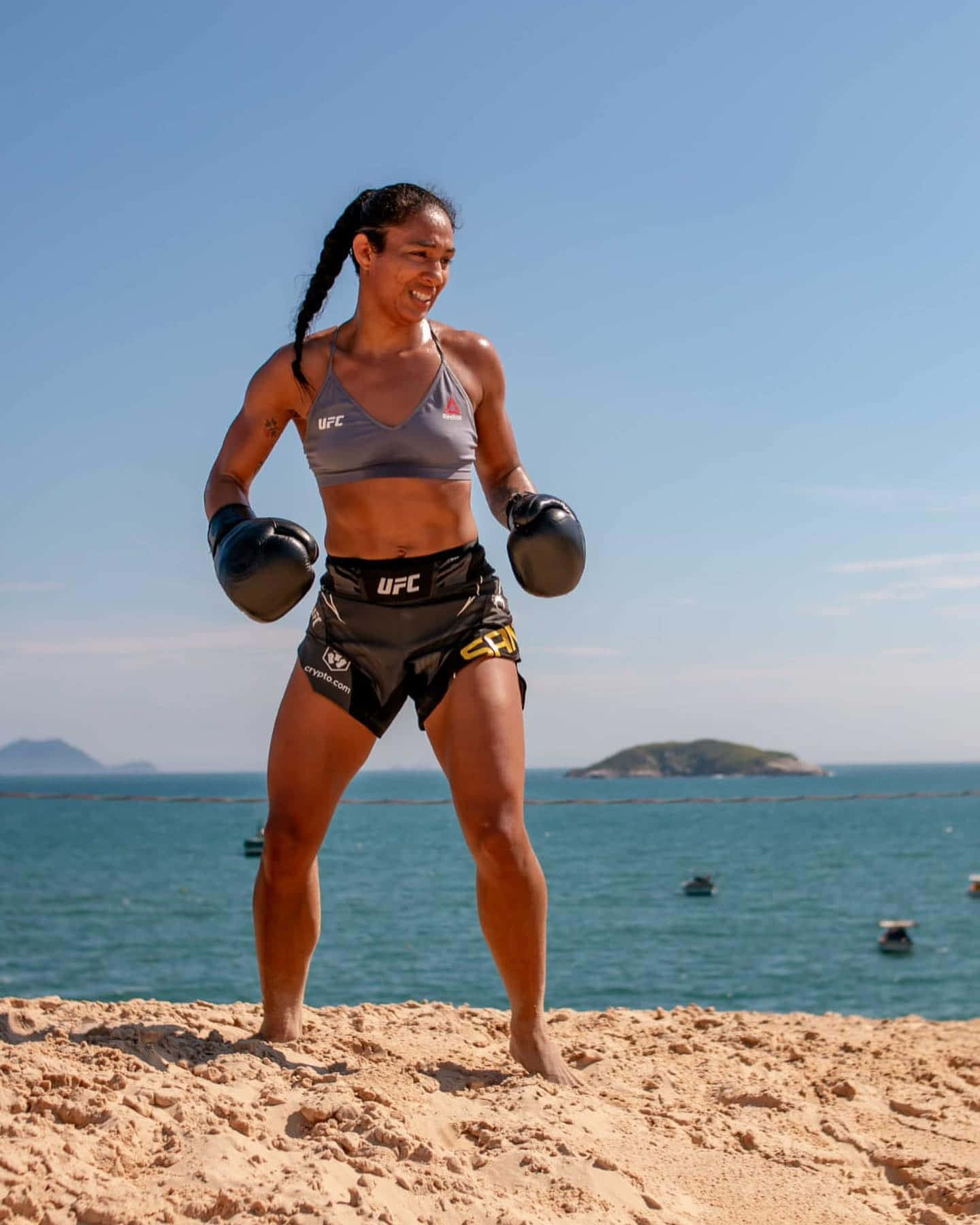 Taila Santos With Boxing Gloves At Beach Wallpaper