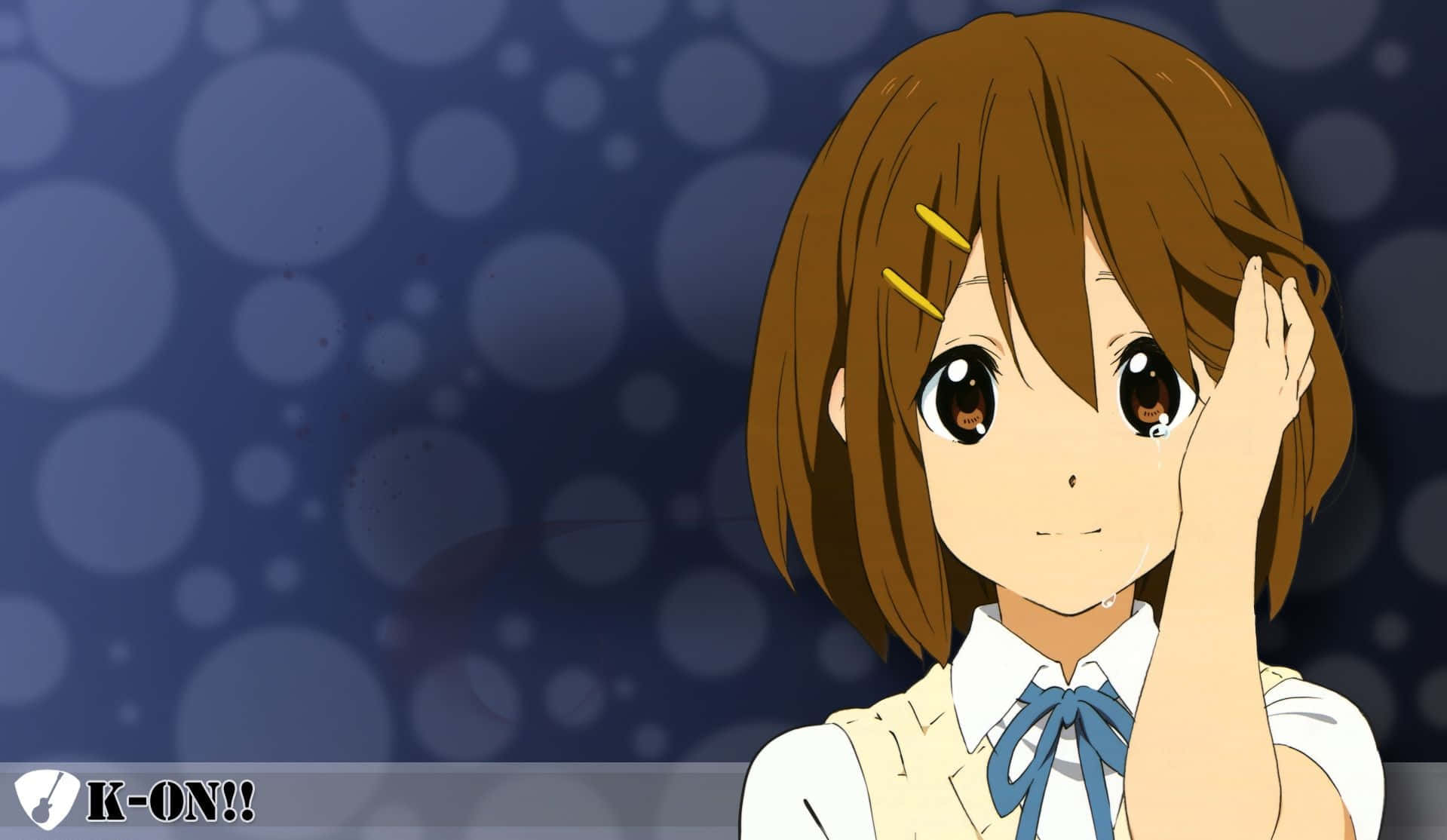 Talented Yui Hirasawa Rocking Out On Her Guitar Wallpaper