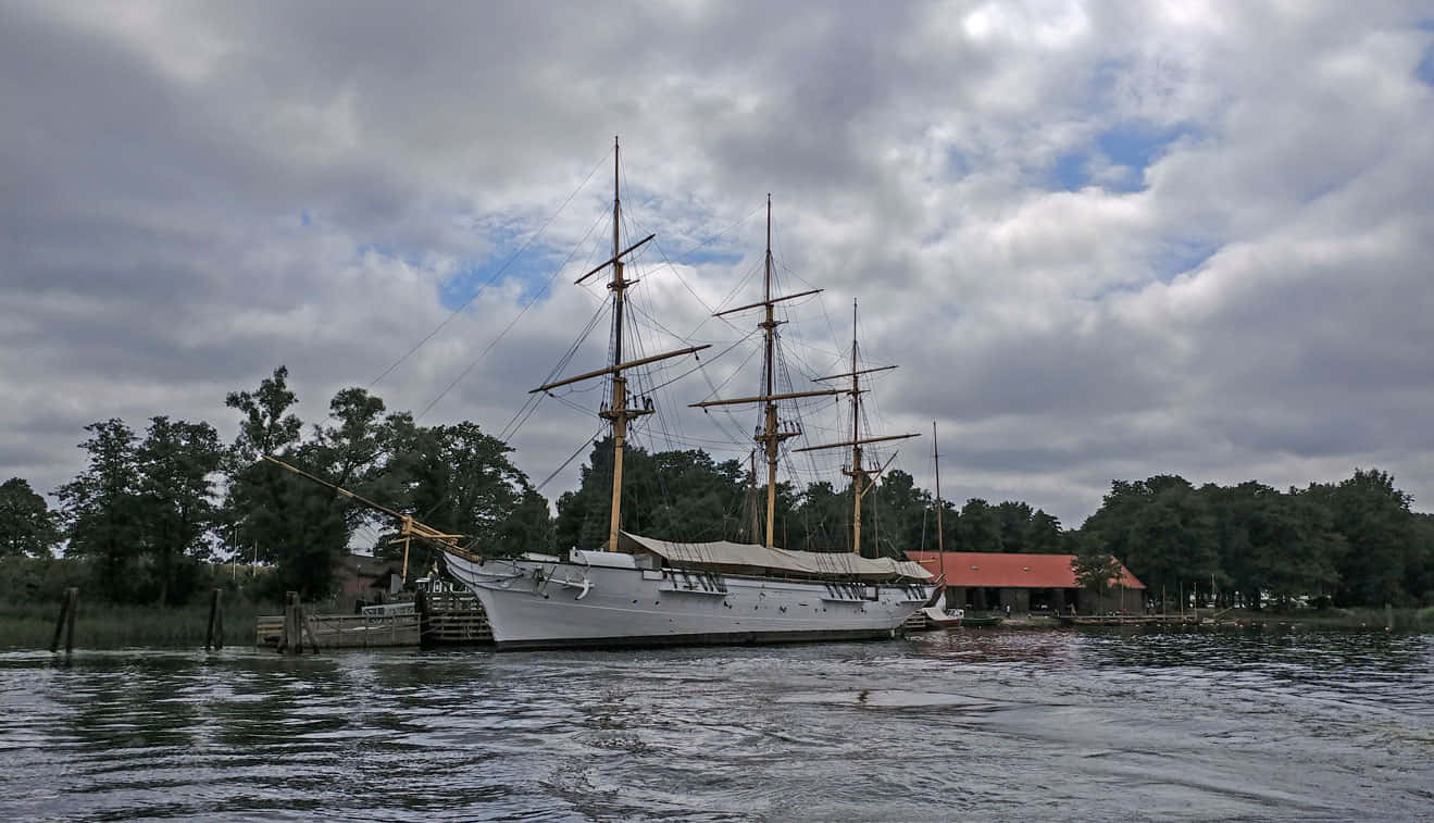 Tall Ship Dockedat Fredrikstad Waterfront Wallpaper