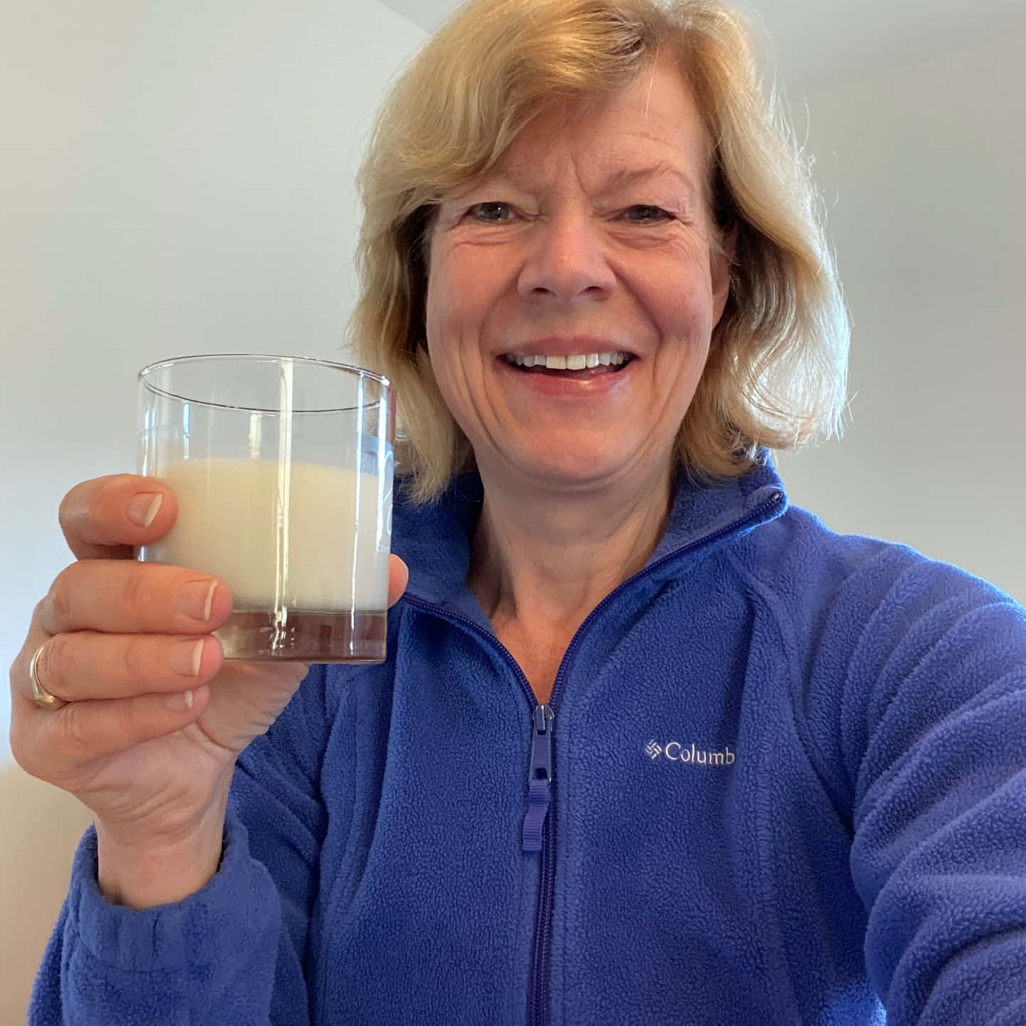 Tammy Baldwin With Glass Of Milk Wallpaper