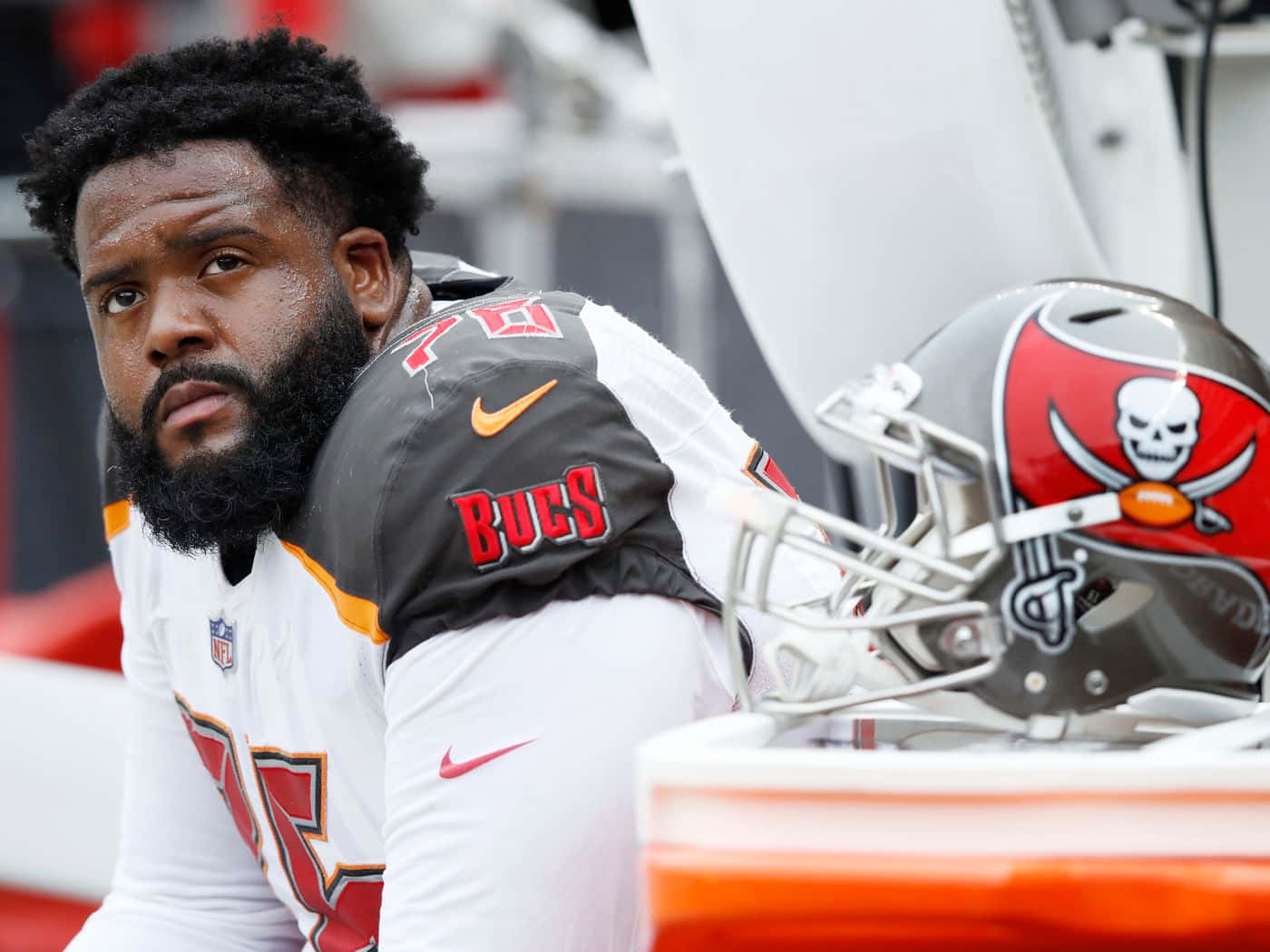 Tampa Bay Buccaneers' Offensive Tackle, Donovan Smith, Relaxing On Sidelines Wallpaper