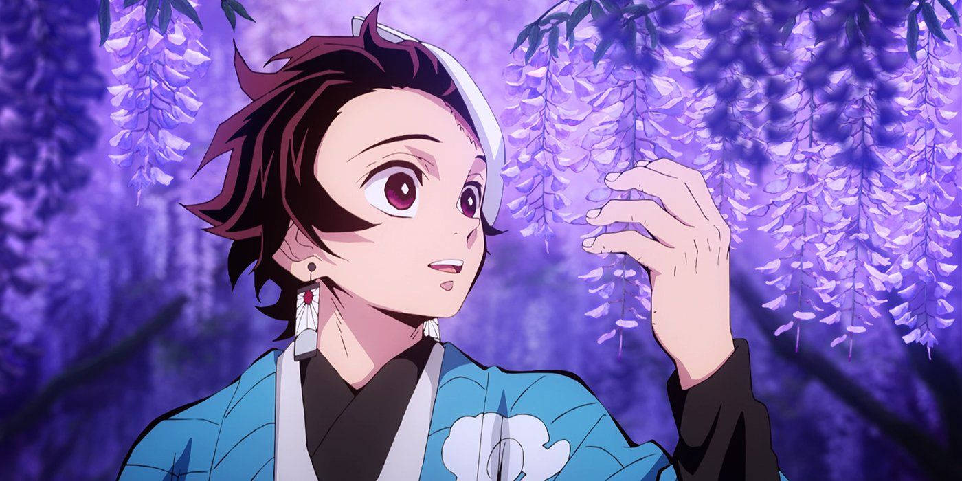 Tanjiro Embraces The Beauty Of Wisteria Flowers Wallpaper