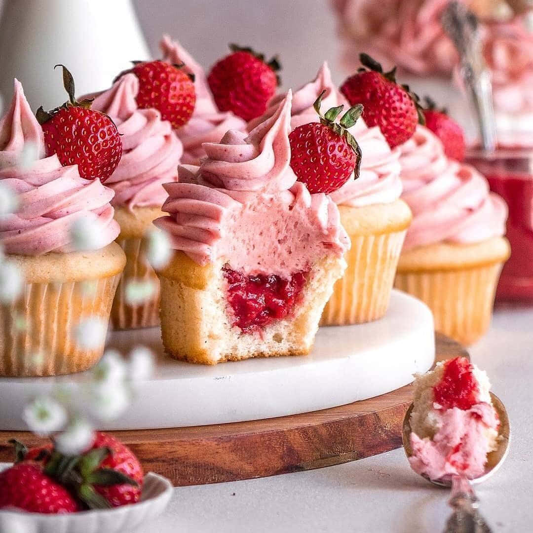 Tantalizing Pink Cupcakes On Display Wallpaper