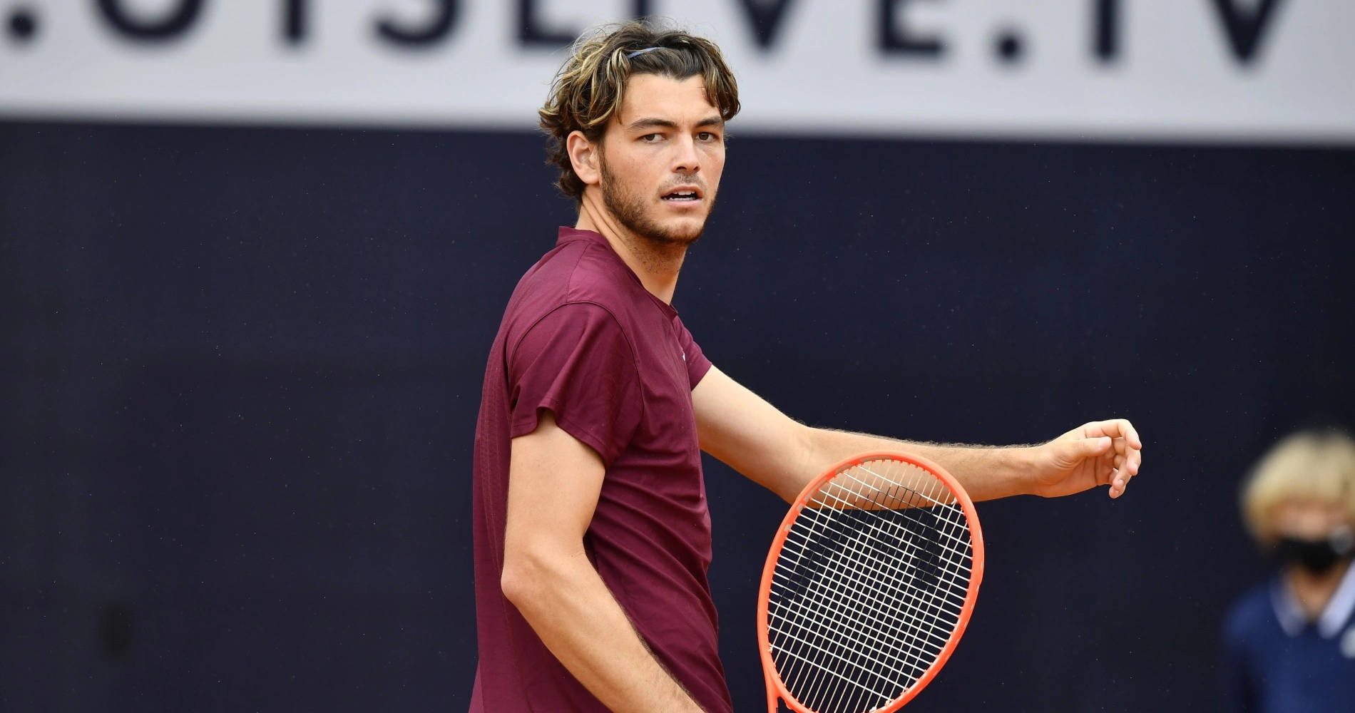 Taylor Fritz In Maroon Shirt Wallpaper