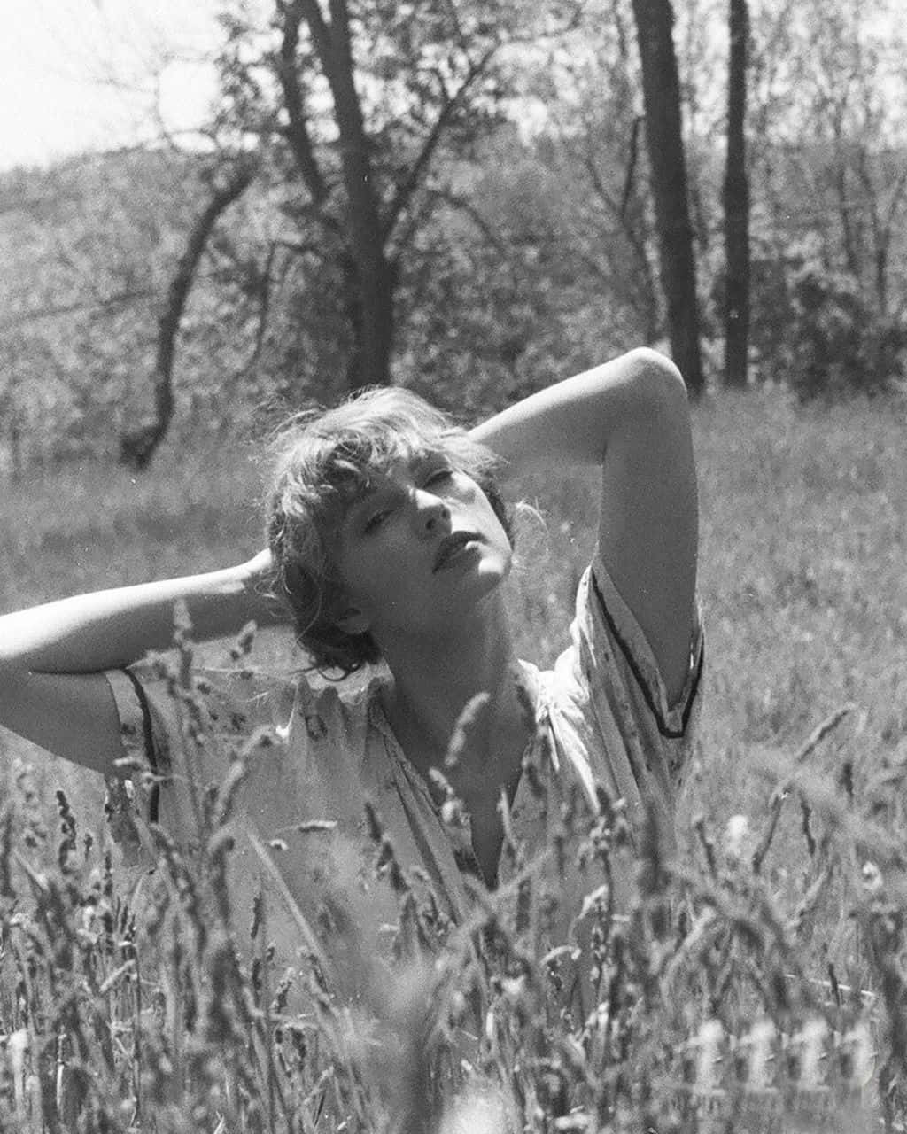 Taylor Swift Poses In A Gorgeous Nature Setting For Her Latest Album Release “folklore” Wallpaper