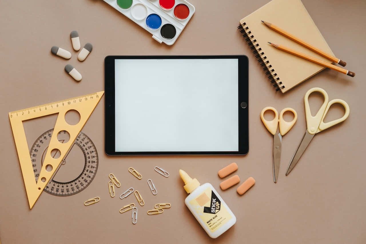 Teacher Desk Essentials Flatlay Wallpaper