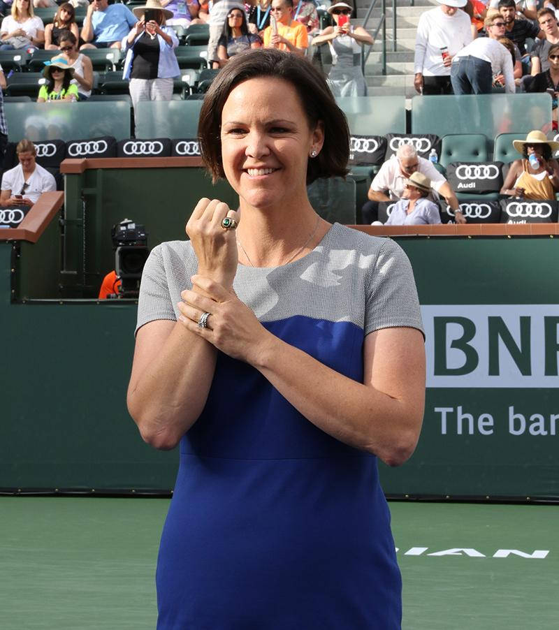 Tennis Champion Lindsay Davenport, Holding Her Wrist After A Powerful Swing. Wallpaper