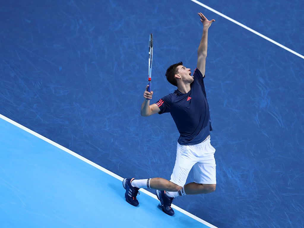 Tennis Player Celebrating Victoryon Court.jpg Wallpaper