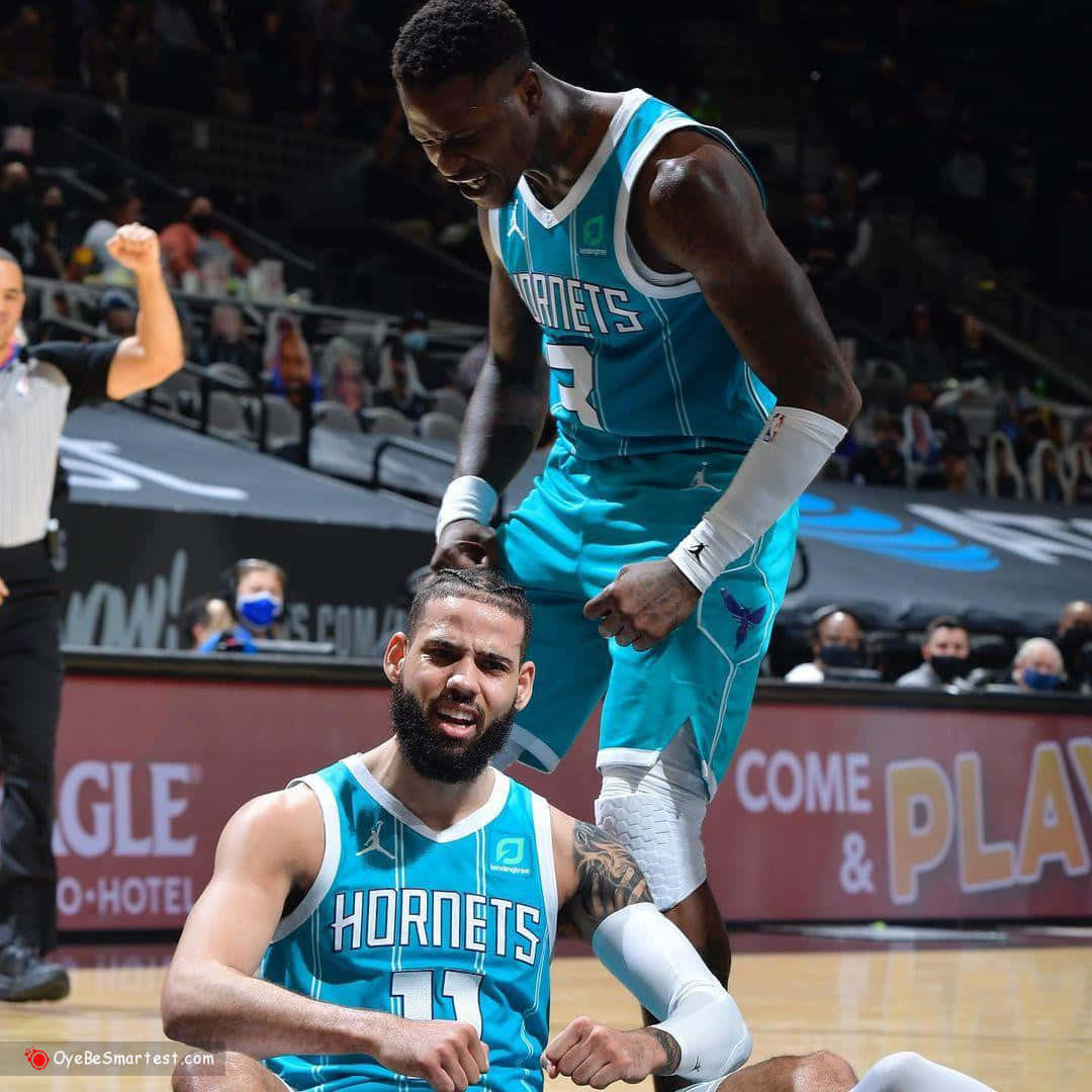 Terry Rozier Hyped With His Teammate Cody Martin Wallpaper