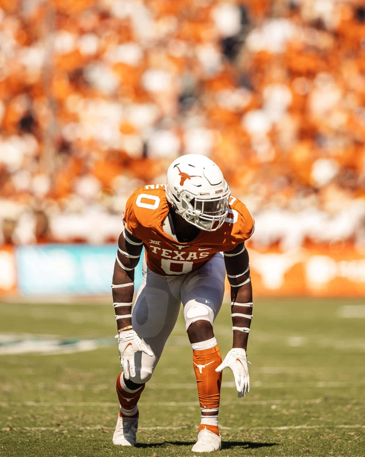 Texas Football Player Ready For Action Wallpaper