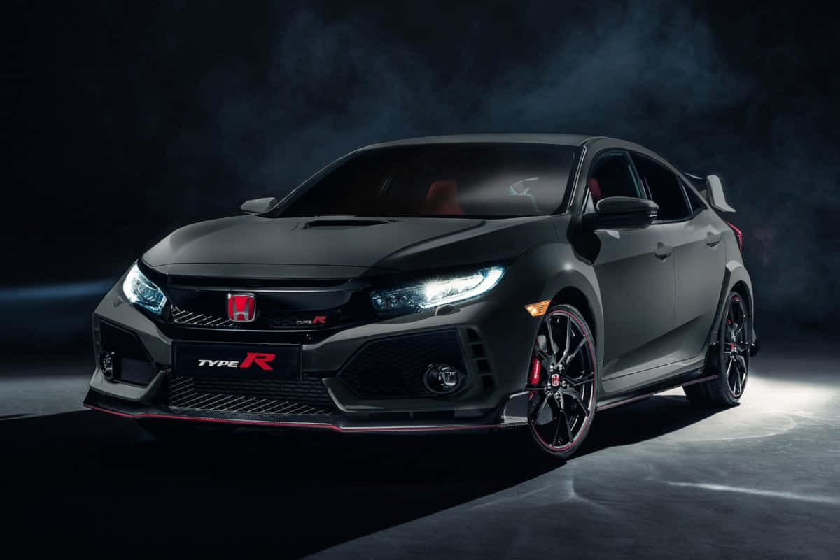 The 2019 Honda Civic Type R Is Shown In A Dark Room Wallpaper