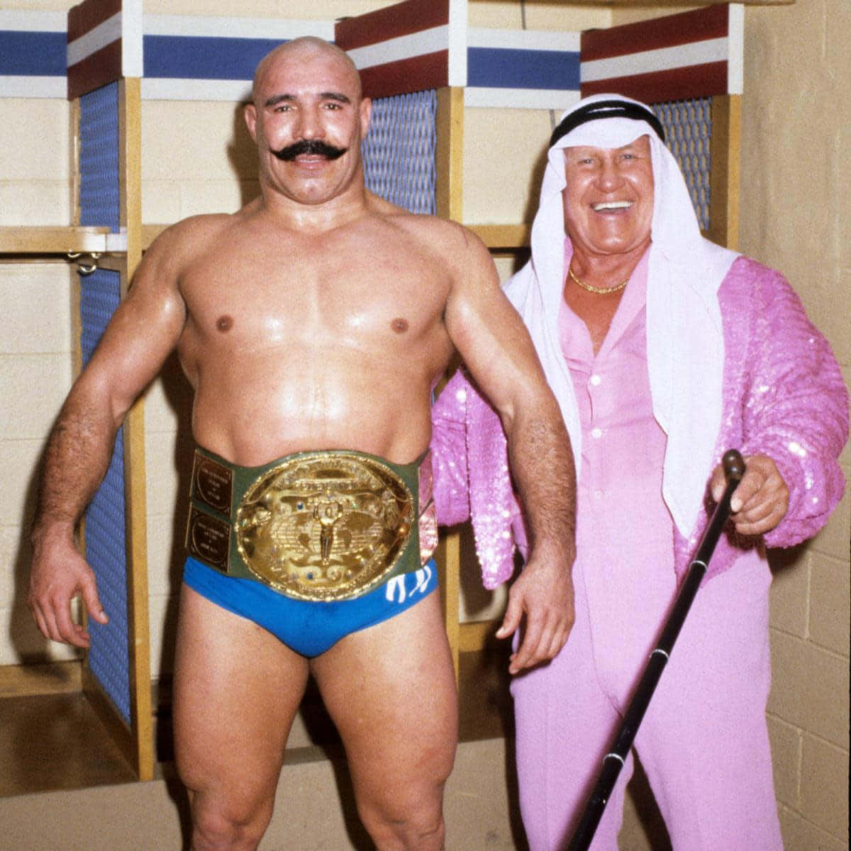 The Iron Sheik With Freddie Blassie In Wrestling Match Wallpaper