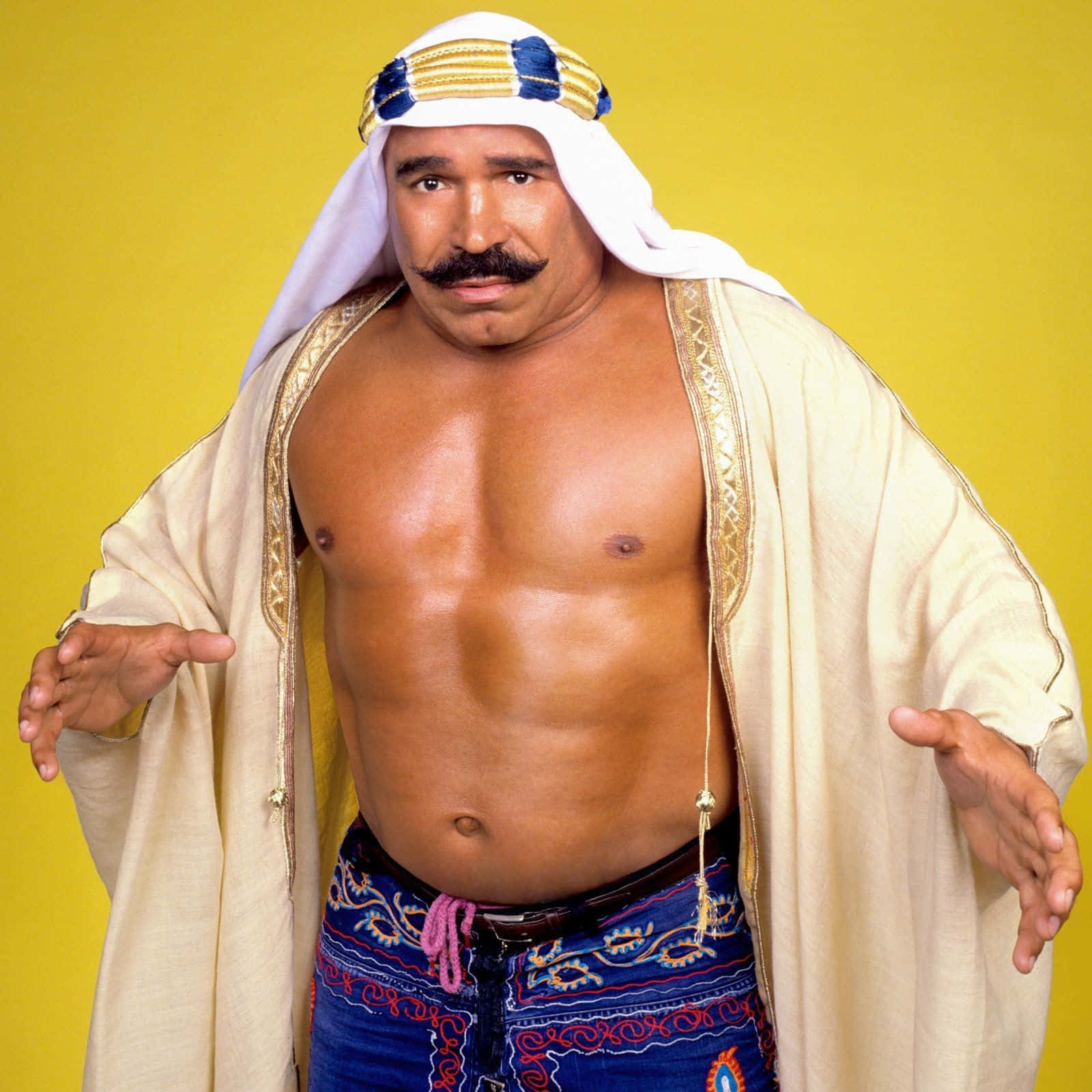 The Iron Sheik Yellow Background Wallpaper