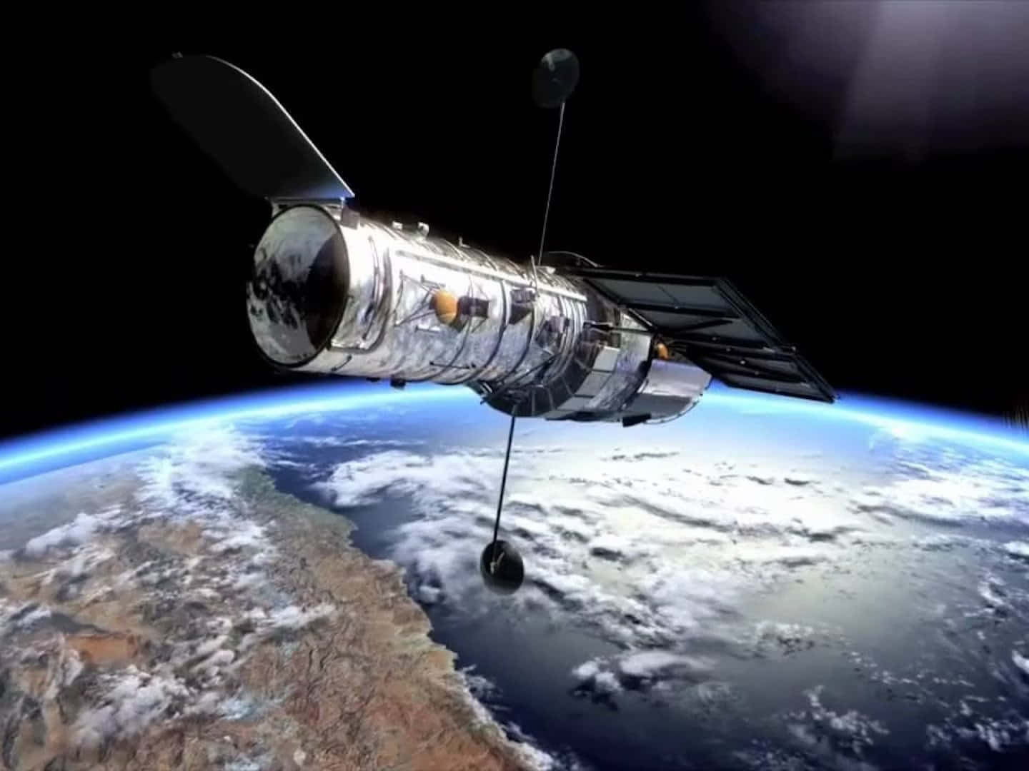 The Majestic Hubble Space Telescope In Orbit Wallpaper