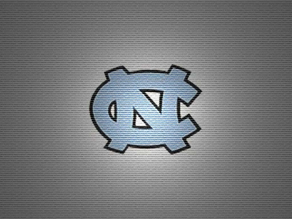 The North Carolina Tar Heels Logo On A Gray Background Wallpaper