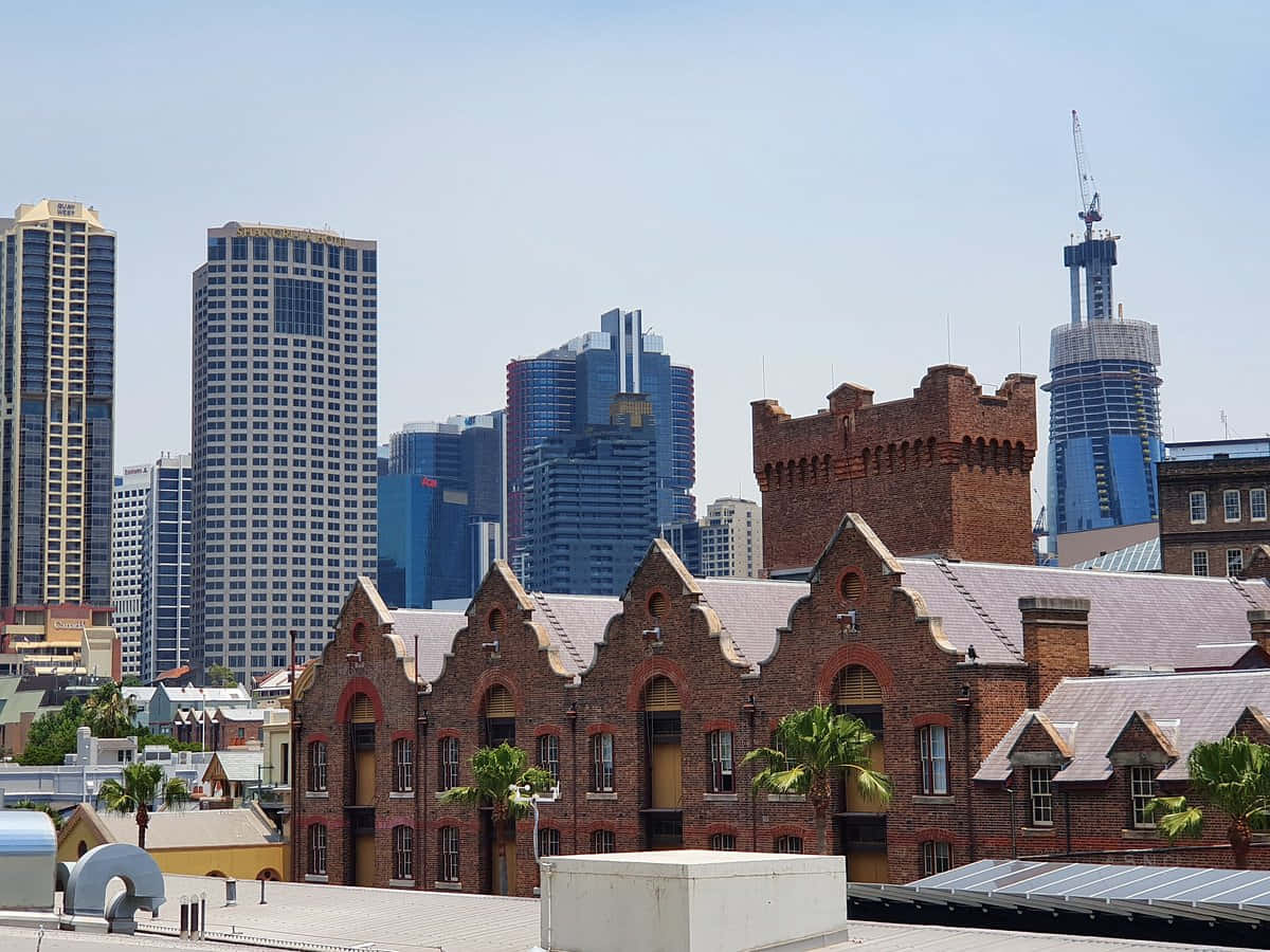 The Rocks Historic Architecture Against Modern Skyline.jpg Wallpaper