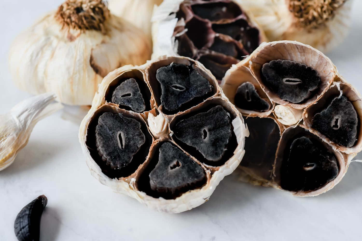 The Savory And Sweet Sweetness Of Black Garlic Wallpaper