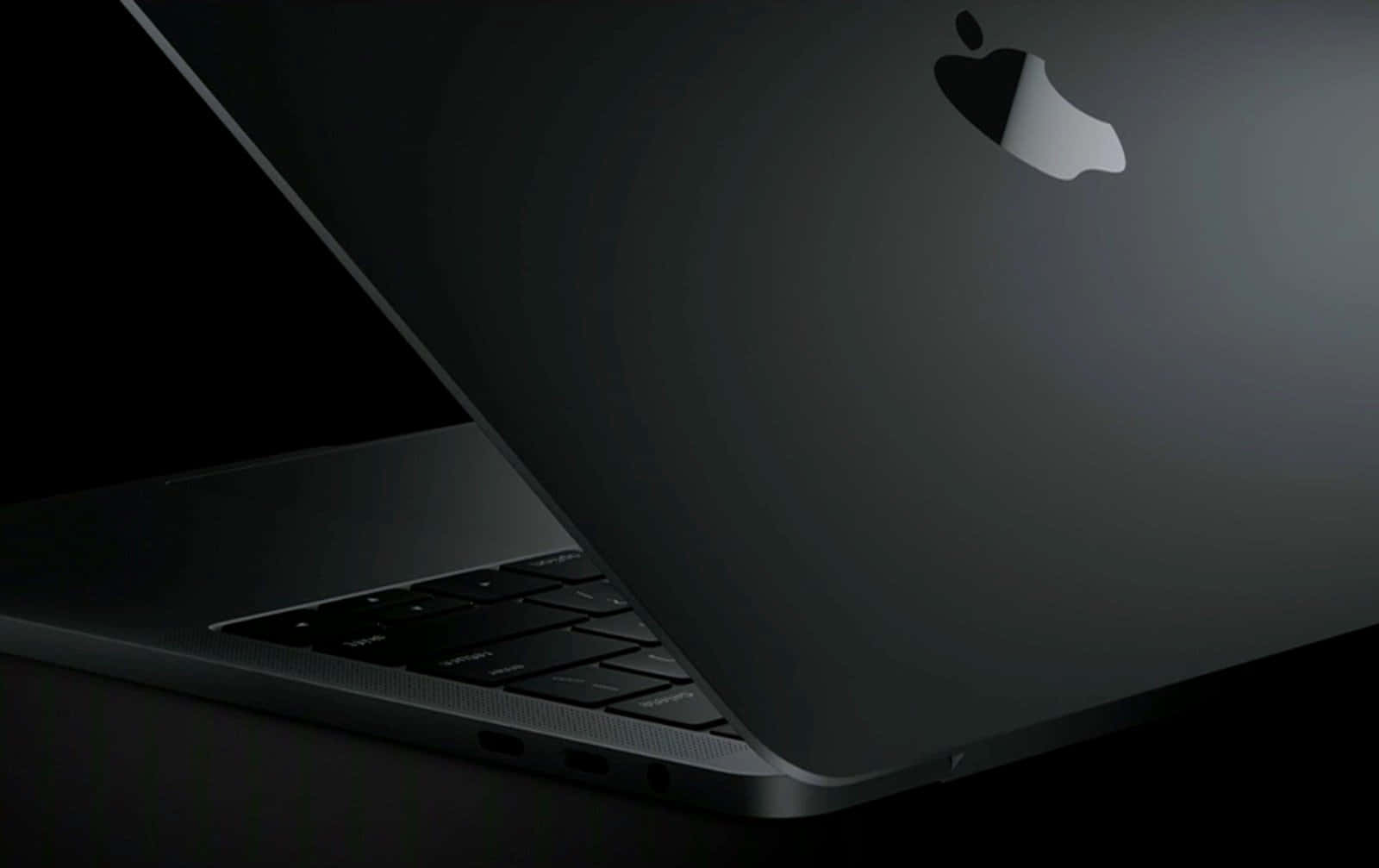 The Sophisticated And Stylish Black Macbook Wallpaper