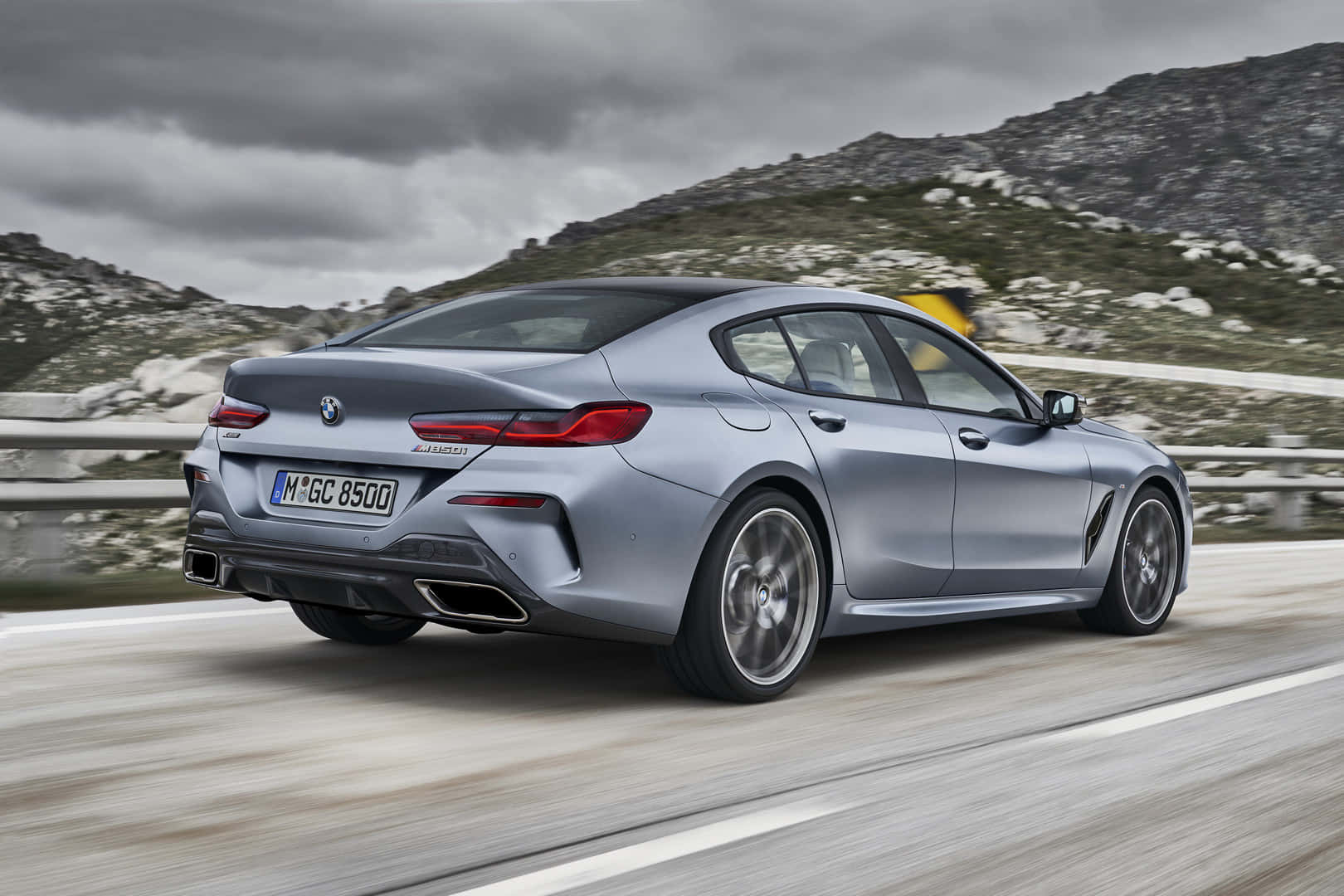 The Stunning Bmw 8 Series Coupe In Action Wallpaper