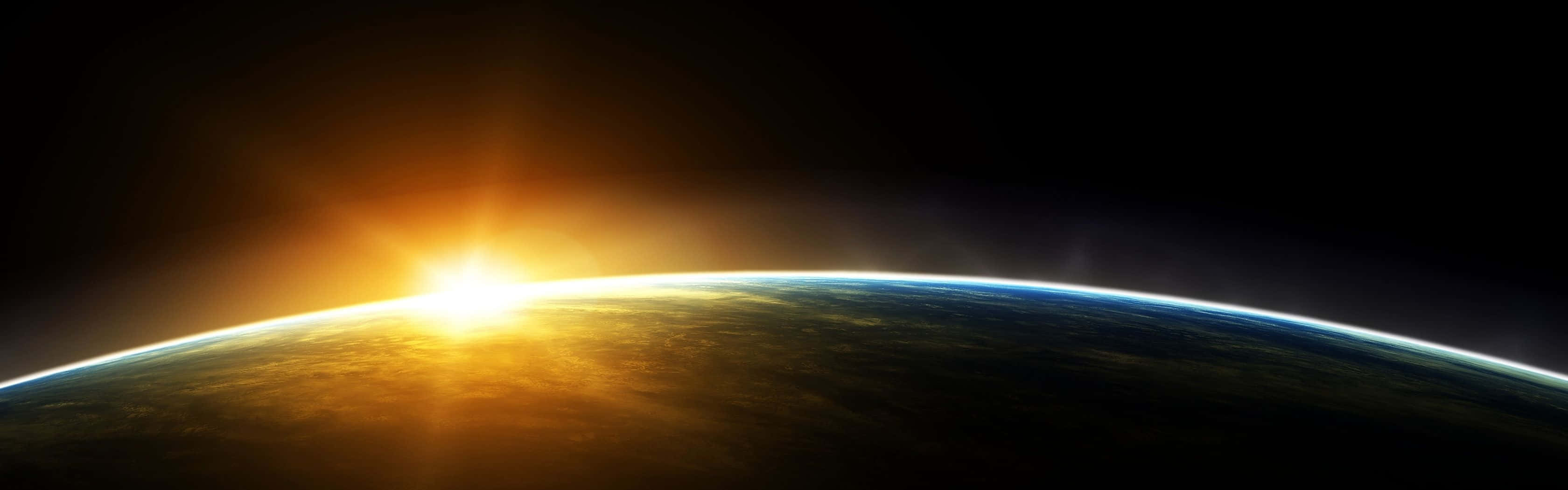 The Sun Rising Over The Earth Wallpaper