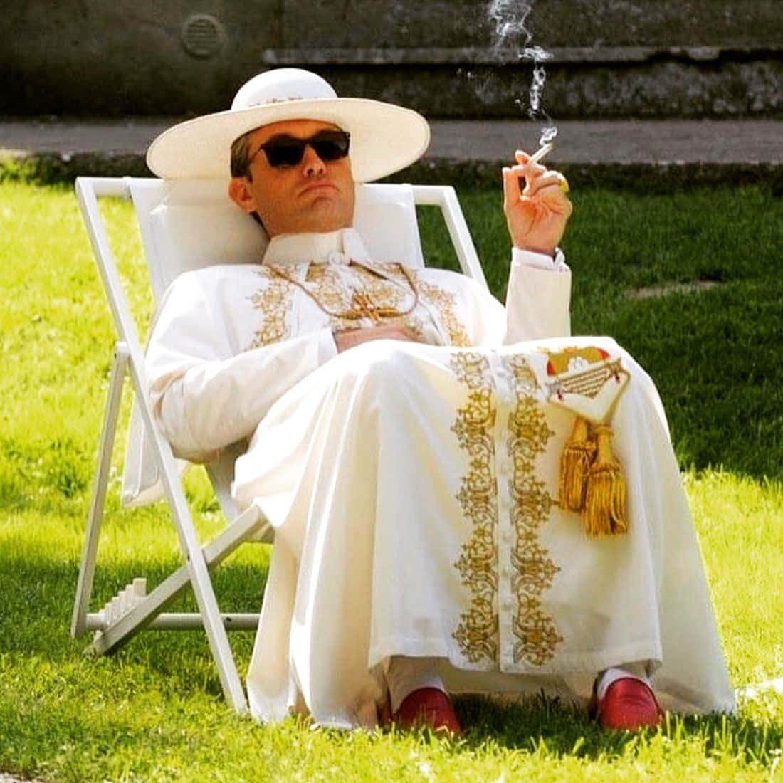 The Young Pope Relaxing Outdoors Wallpaper