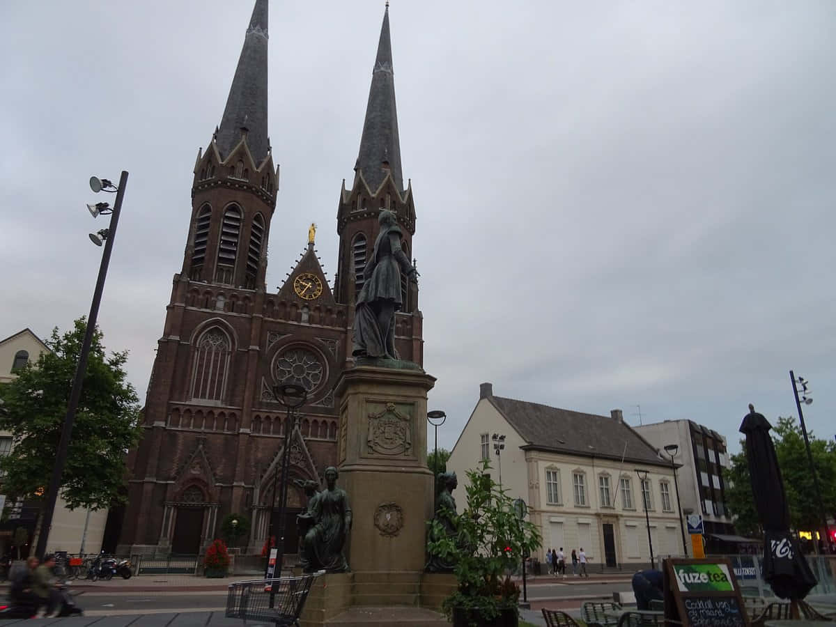 Tilburg Churchand Statue Wallpaper