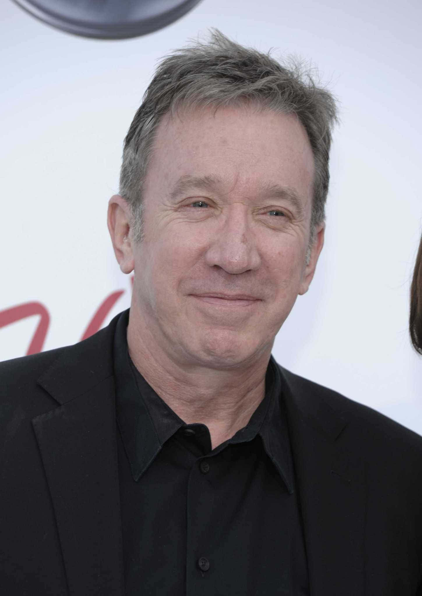 Tim Allen, Beloved Comedic Actor Standing On A Stage. Wallpaper