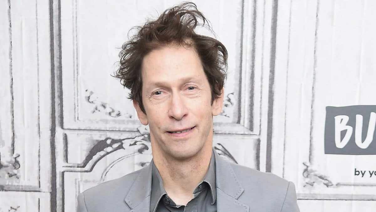 Tim Blake Nelson In A Contemplative Pose Wallpaper