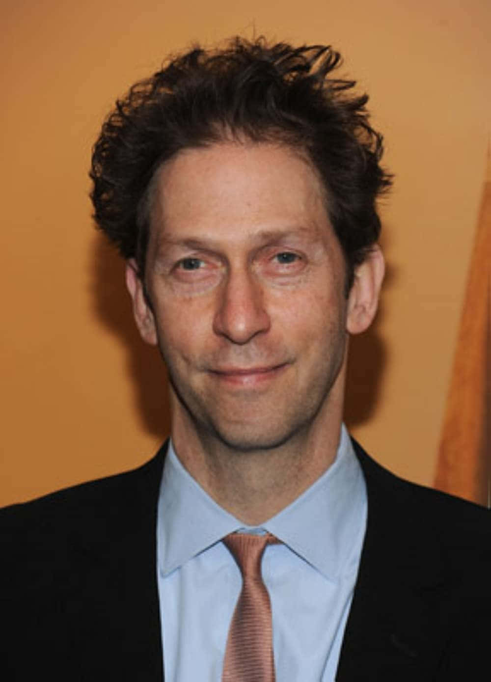 Tim Blake Nelson Posing For A Photoshoot Wallpaper