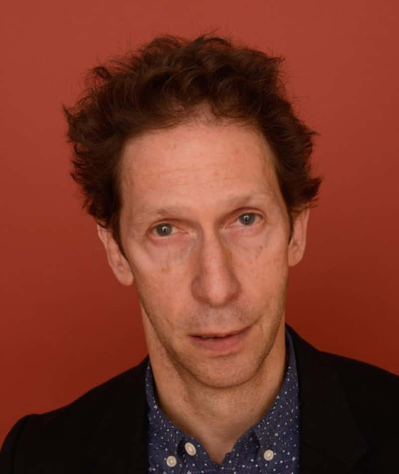 Tim Blake Nelson Posing For A Portrait Wallpaper