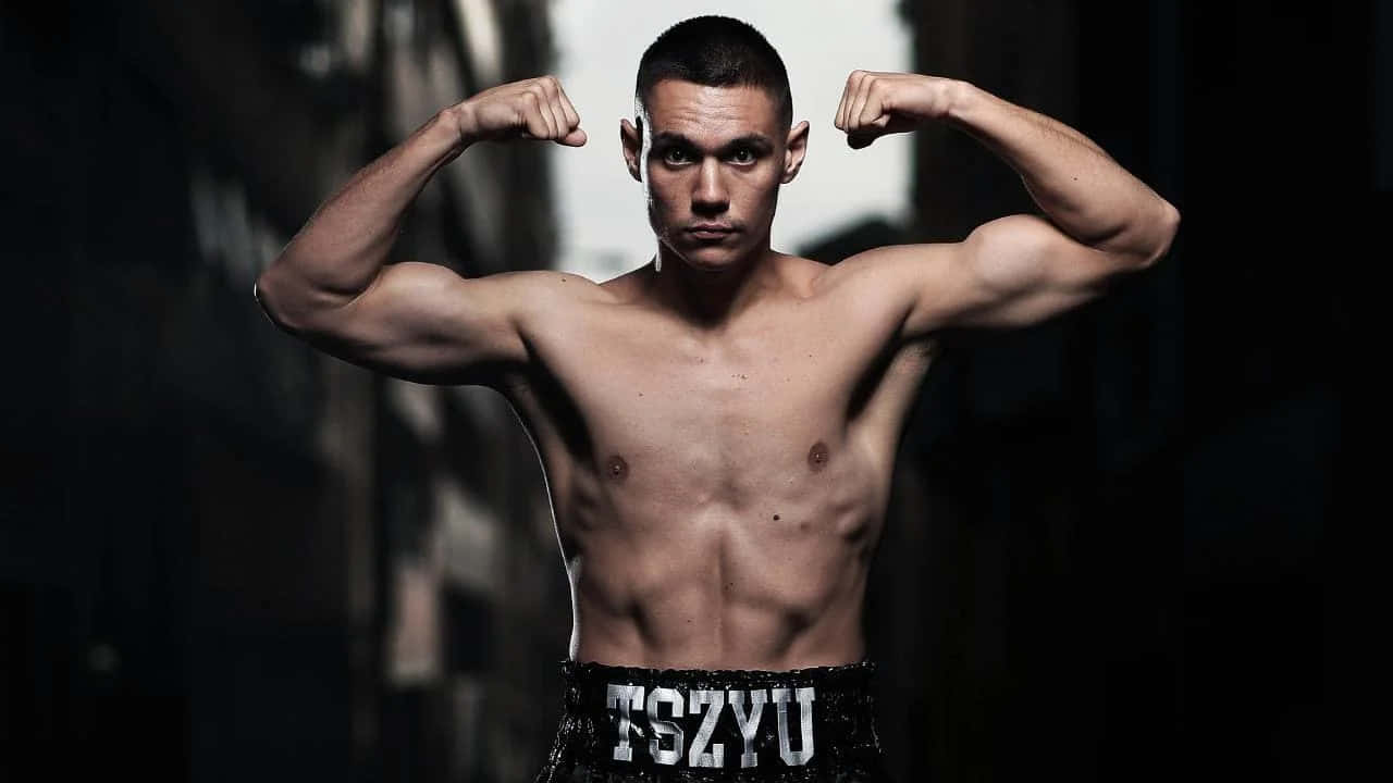 Tim Tszyu Celebrating Victory In The Ring Wallpaper