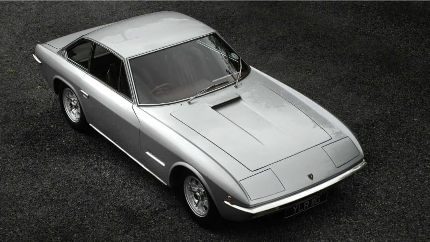 Timeless Elegance - Lamborghini Islero In Full Glory Wallpaper