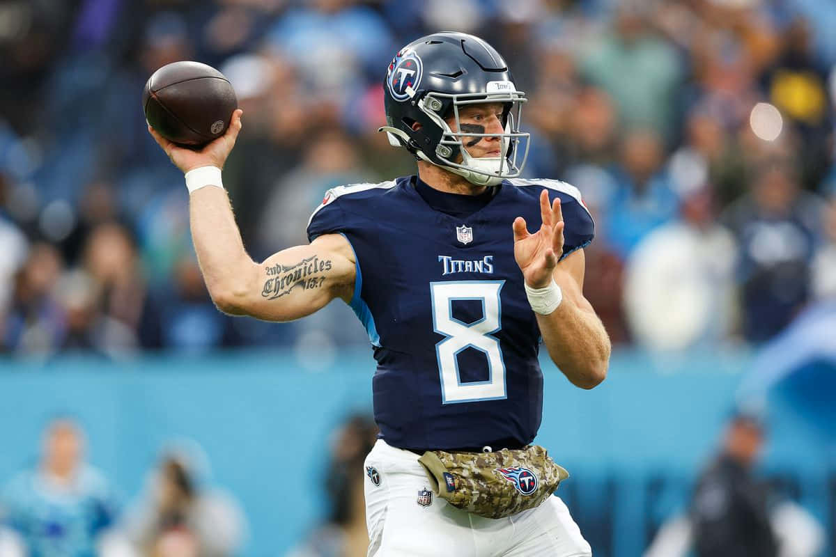 Titans Quarterback Throwing Football Wallpaper