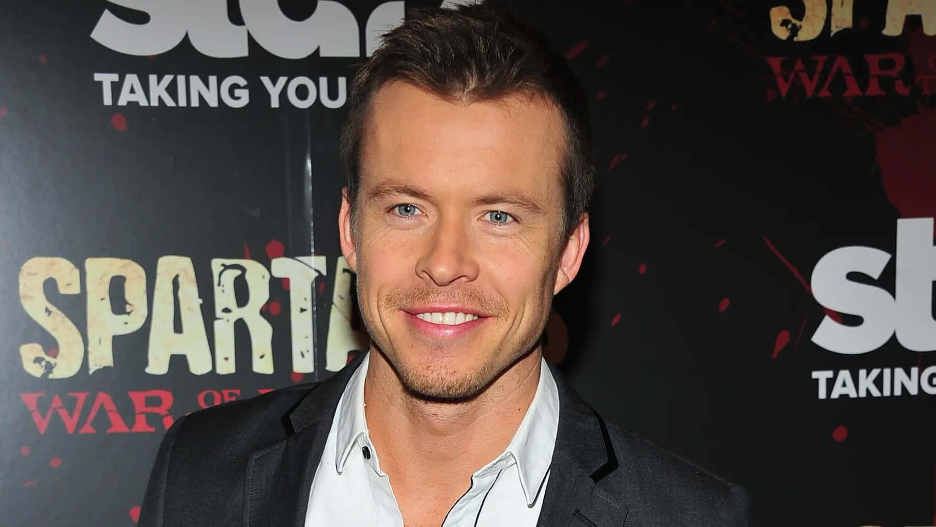 Todd Lasance Red Carpet Smile Wallpaper