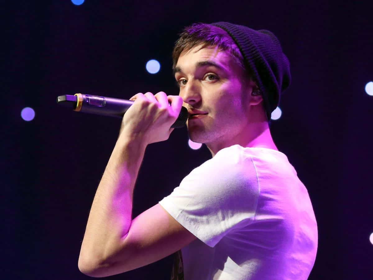 Tom Parker Striking A Pose During A Photoshoot Wallpaper