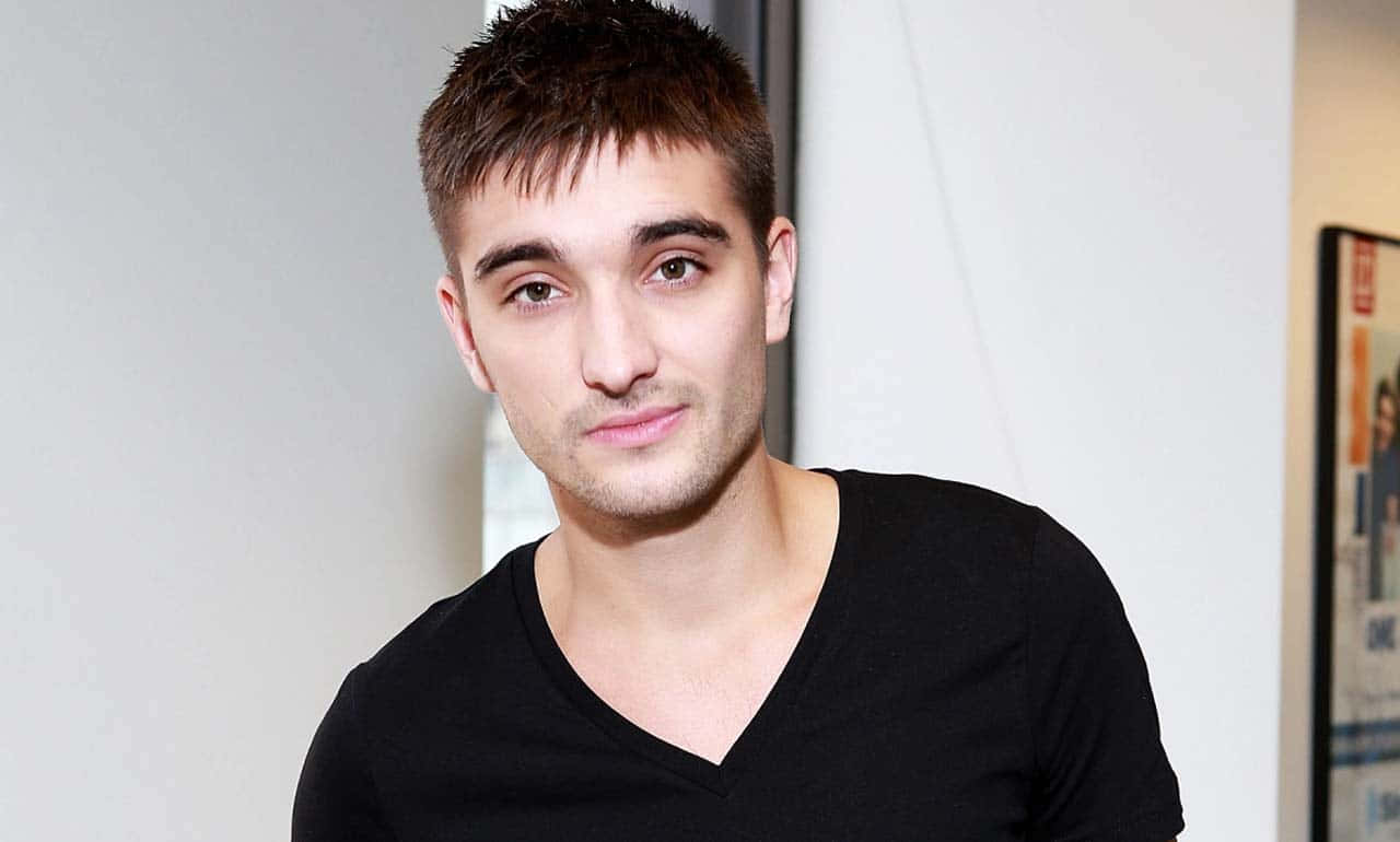 Tom Parker Striking A Pose During A Photoshoot Wallpaper