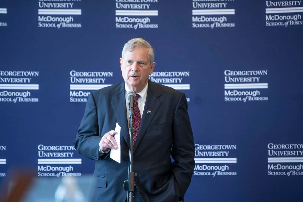 Tom Vilsack Speaking At Georgetown University Wallpaper