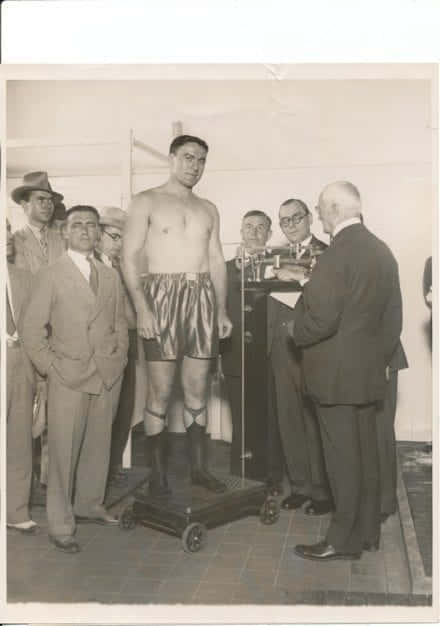 Tommy Loughran Weighing In Before A Match Wallpaper