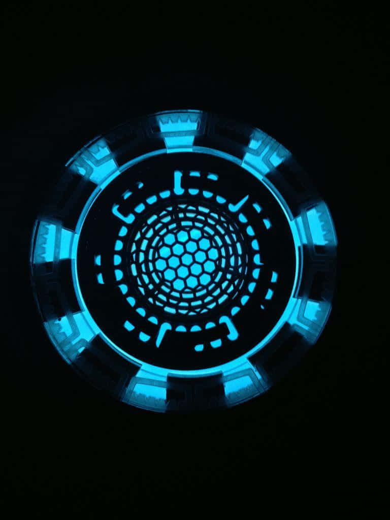 Tony Stark's Revolutionary Inventions: The Iron Man Arc Reactor Wallpaper