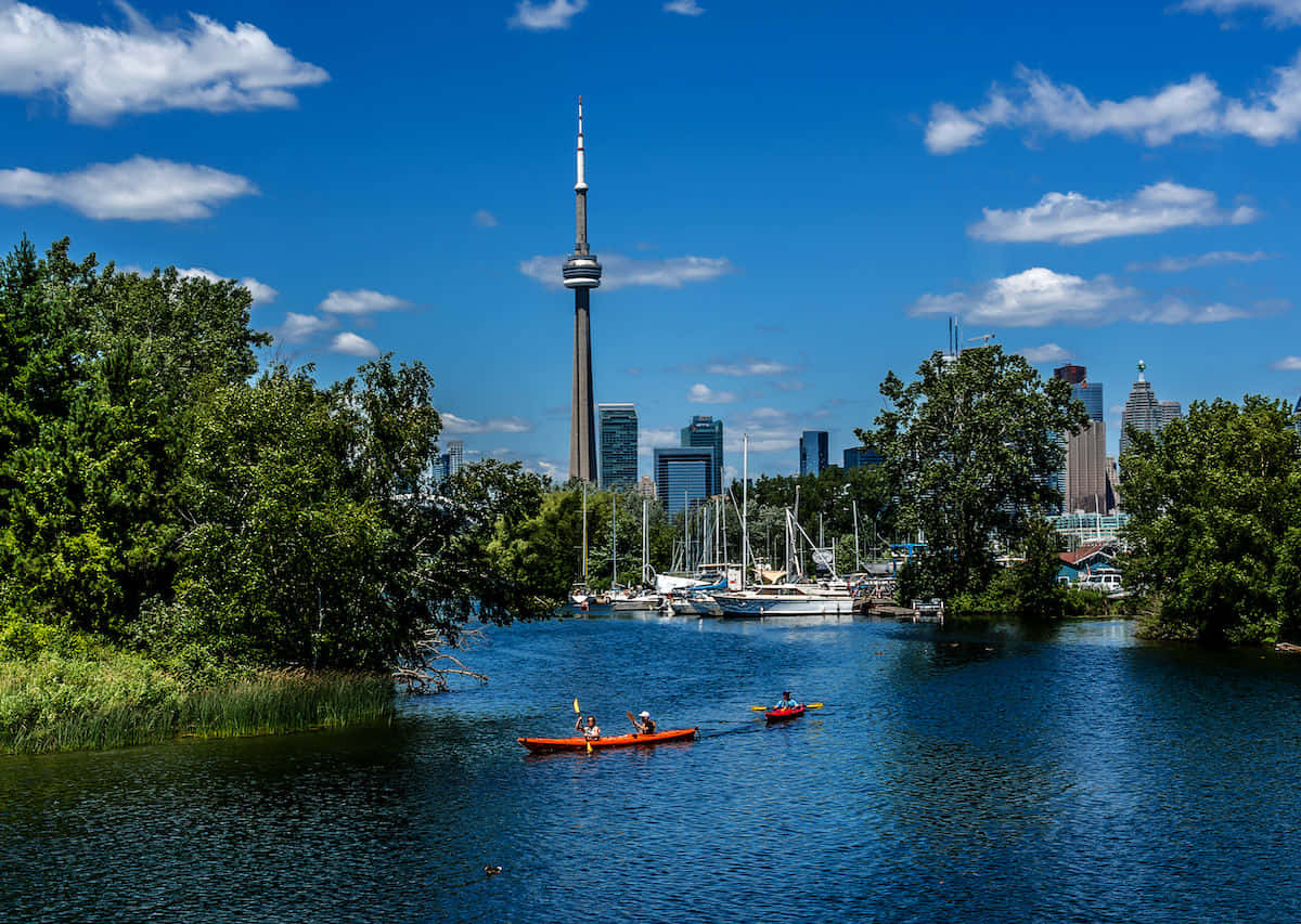 Toronto_ Islands_ View_with_ Canoeists_and_ Cityscape Wallpaper