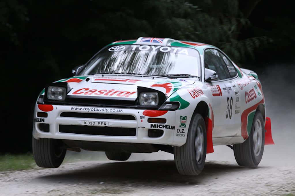 Toyota Celica Rally Car Action Wallpaper