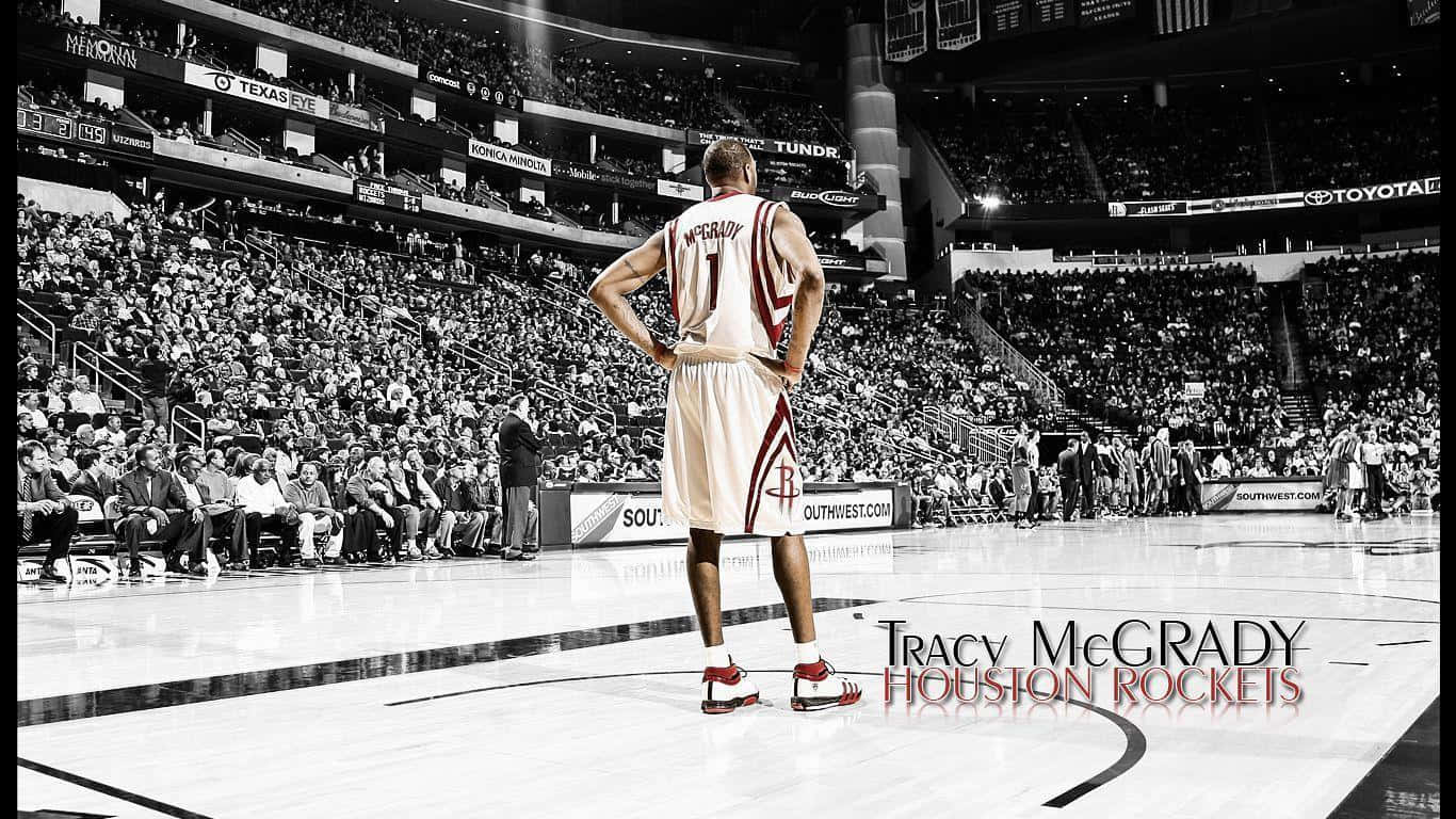 Tracy Mcgrady Playing For Nba Team Orlando Magic Wallpaper