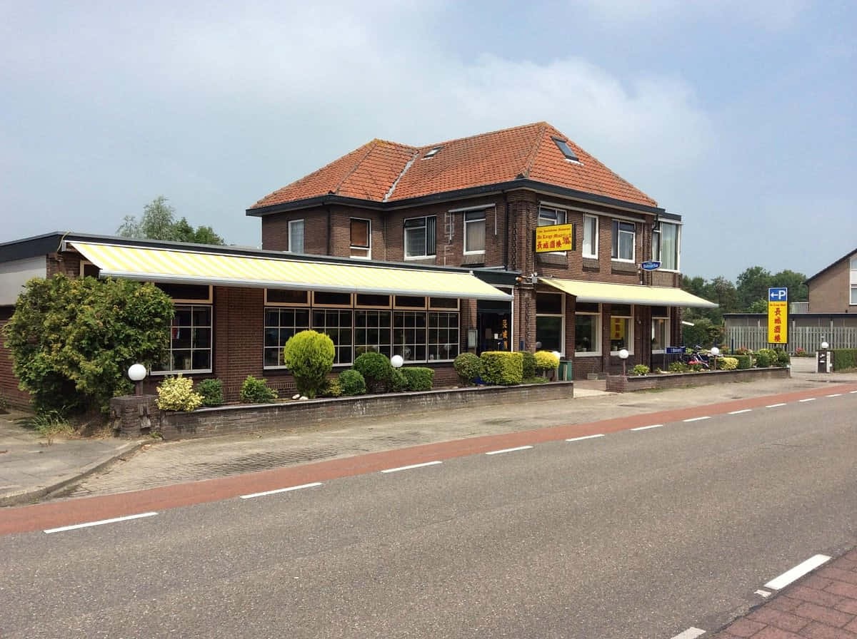 Traditional Dutch Buildingwith Awning Wallpaper