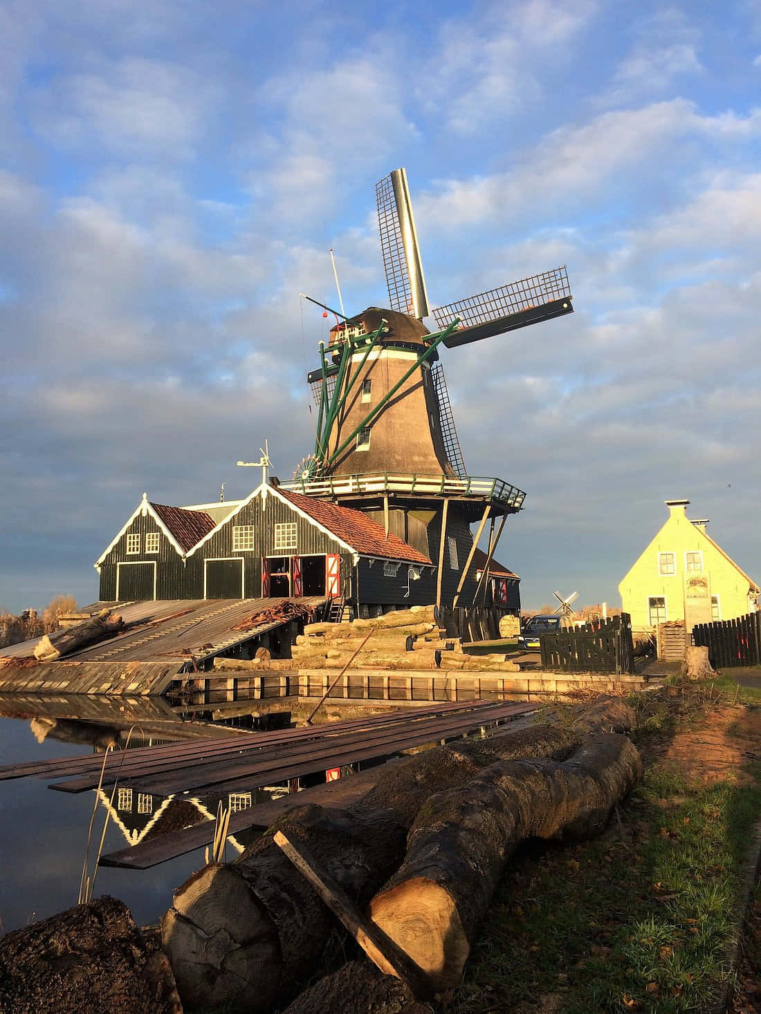 Traditional Dutch Windmillat Sunset Wallpaper