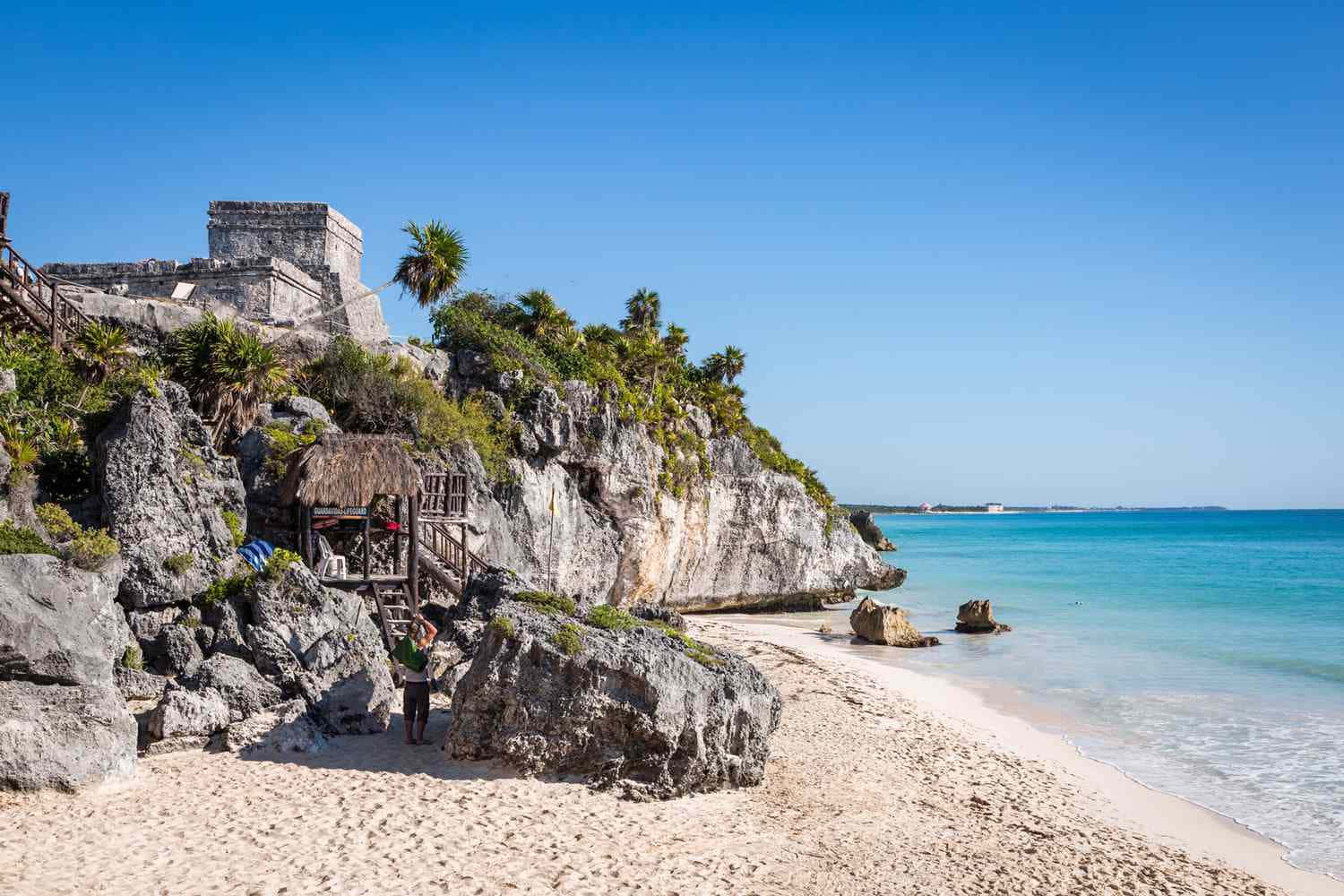 Tranquil Mexican Beach At Sunset Wallpaper