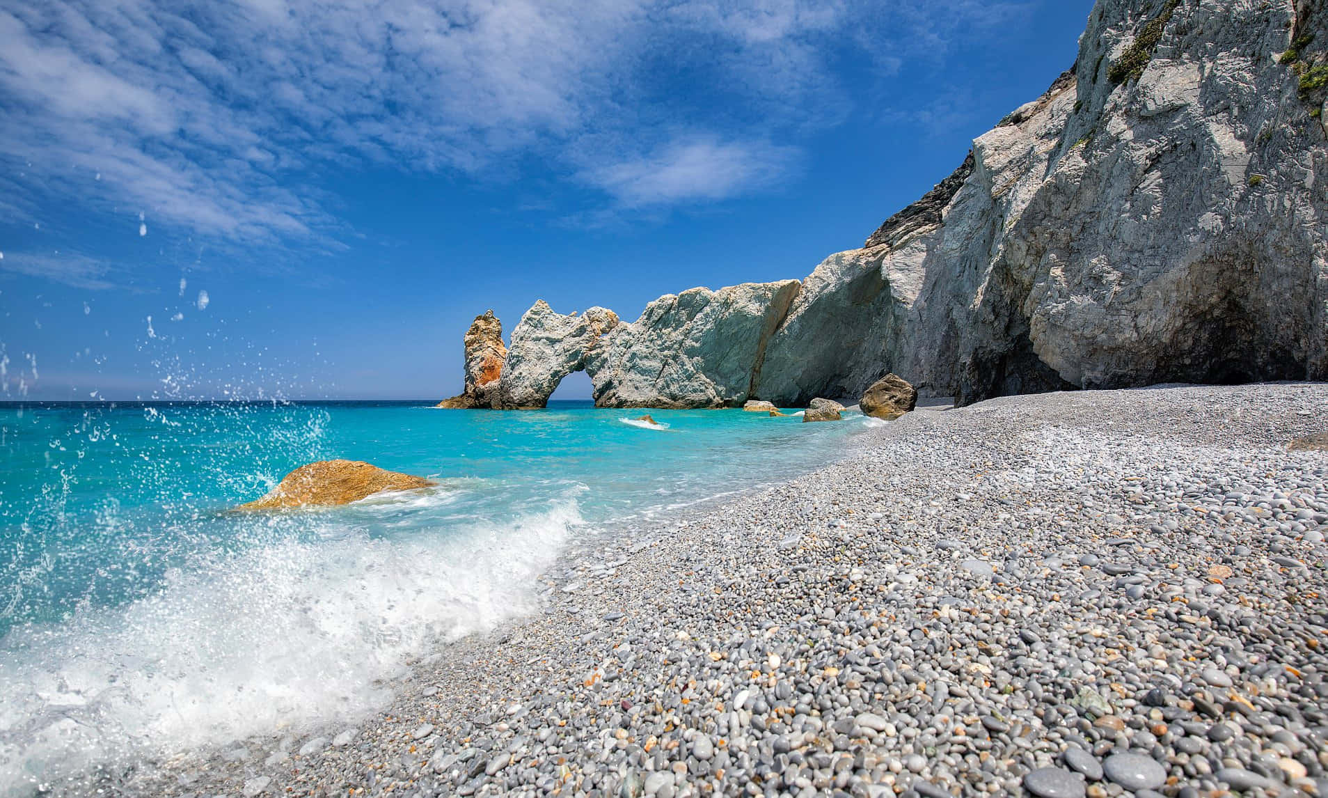 Tranquil Sunset At A Greek Beach Wallpaper