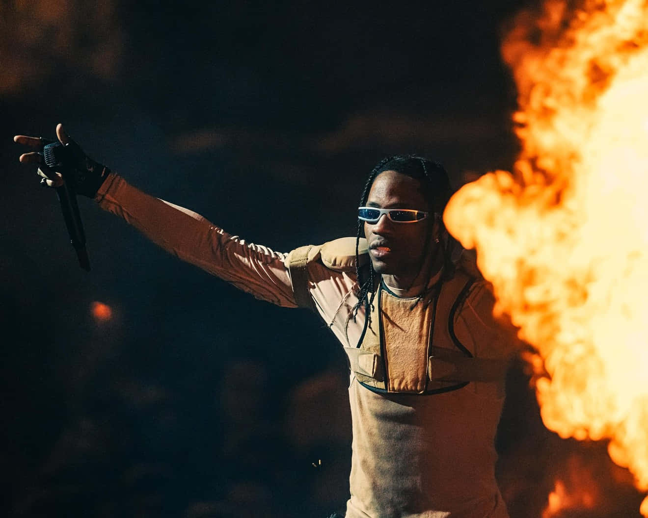 Travis Scott Performance With Fire Backdrop Wallpaper