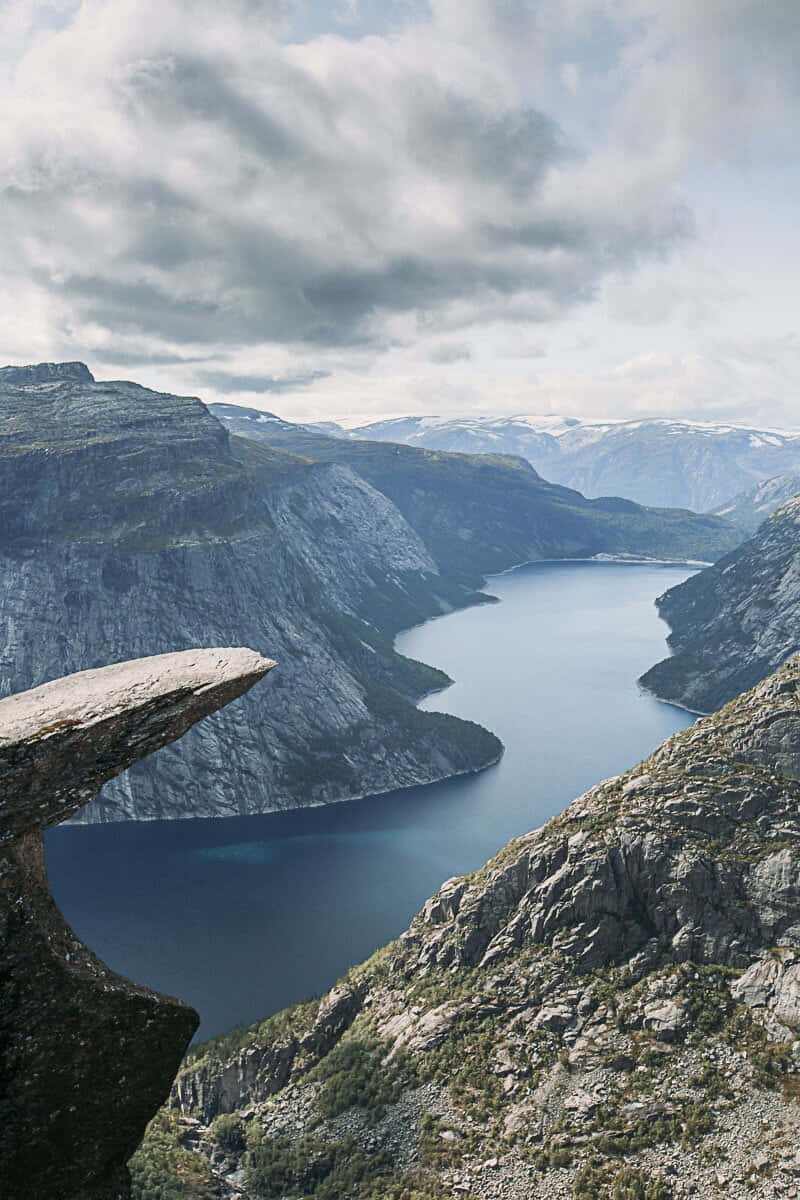 Trolltunga In Dim And Cloudy Weather Wallpaper