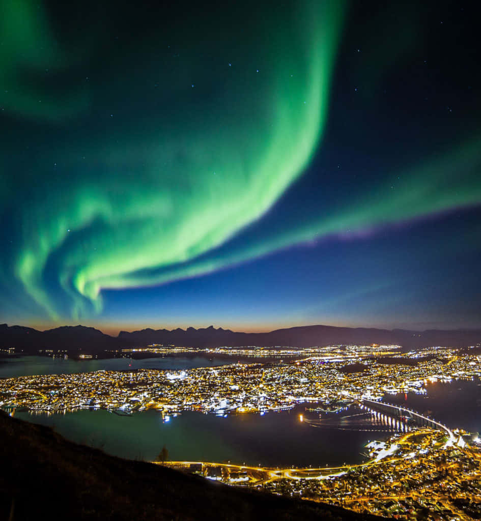 Tromso Northern Lights Over Cityscape Wallpaper